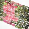 Bead, Tourmaline (Natural), 8-11mm Smooth Oval, B- Grade, Mohs Hardness 7, Sold Per 14nch Strand - Tourmaline (tur-mah-Leen) is a crystal boron silicate mineral compounded with elements such as aluminium, iron, magnesium, sodium, lithium, or potassium. Tourmaline is classified as a semi-precious stone and the gemstone comes in a wide variety of colors. 